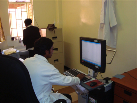 Dr. Siddiqi in neurophysiology laboratory