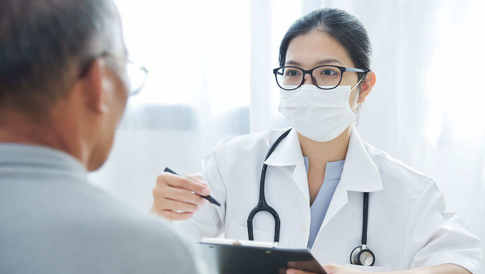Urgent Care Doctor with Patient