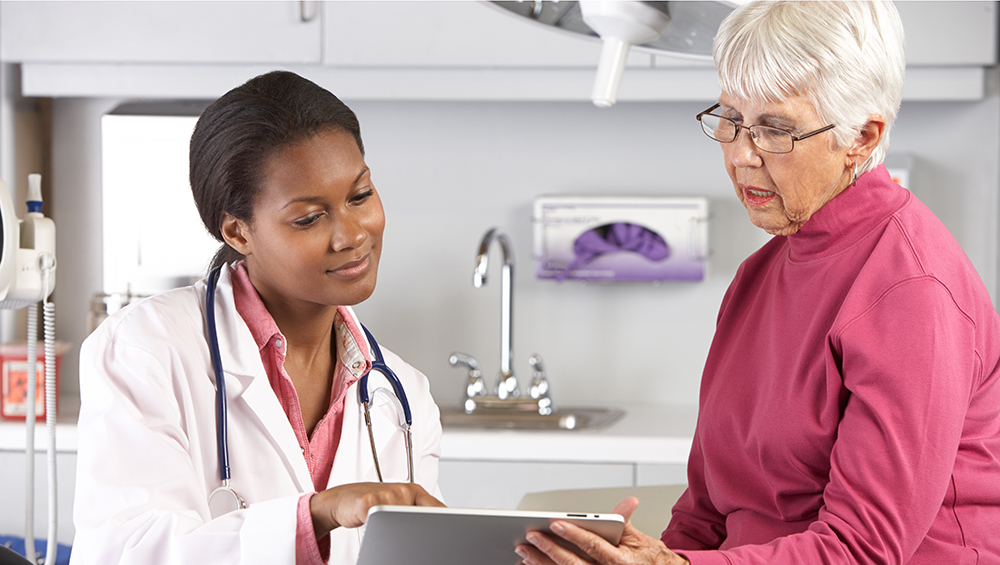 senior woman discussing Alzheimer warning signs