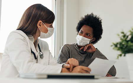 Clinician reviews information with patient Clinician reviews information with patient