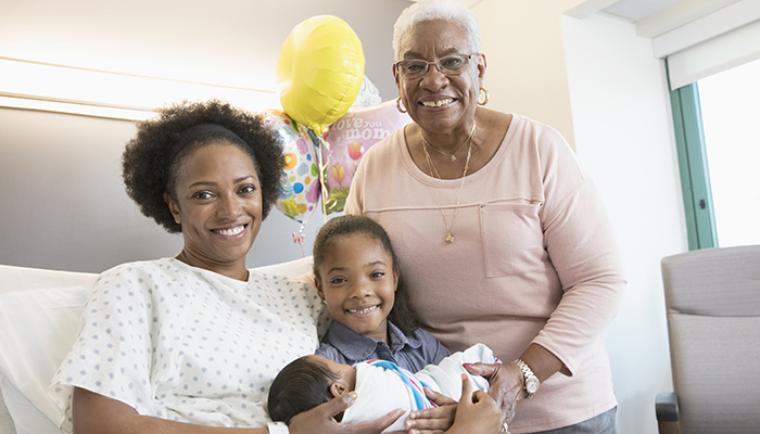 Black Parent, Grandparent, Child and Newborn