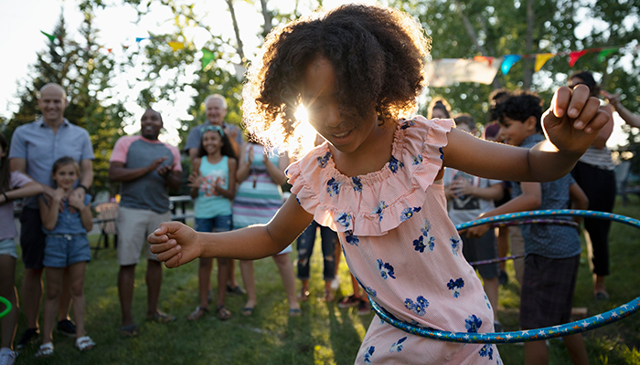 Black Girl Hula Hooping at Neighborhood Party