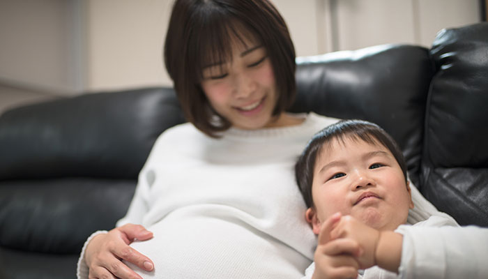 Pregnant Asian Mom with Child