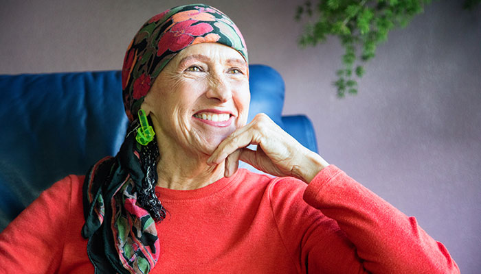Breast Cancer Survivor Wearing Head Scarf