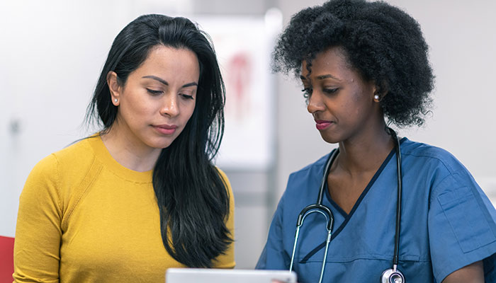 Breast cancer patient meets oncologist to discuss surgery