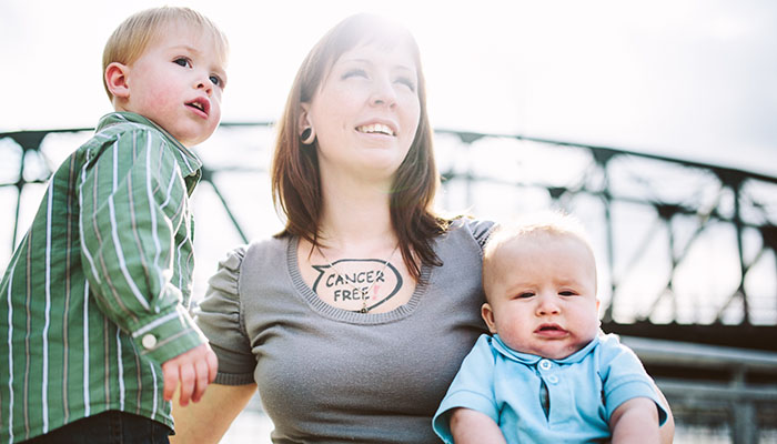 Cancer Free Tattoo on Young Mother