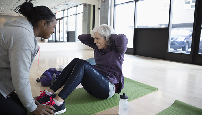 Woman exercising to prevent breast cancer