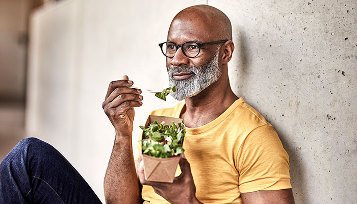 Cancer Survivor Eating Salad