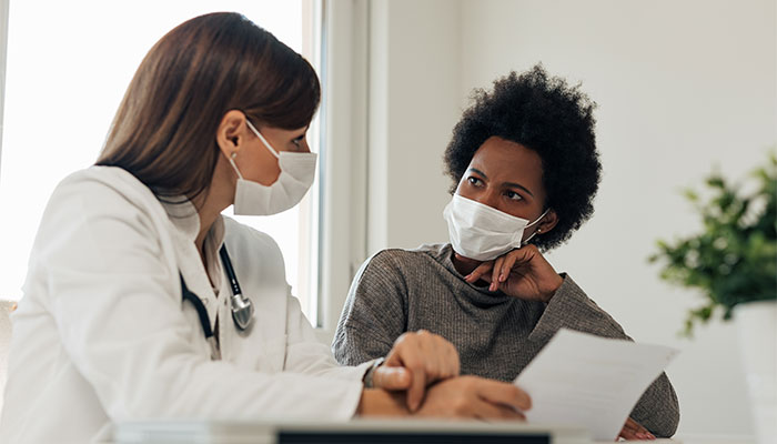 A doctor and patient discuss test results