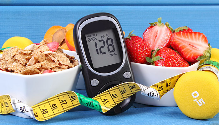 Glucose Meter, Healthy Foods and a Dumbell