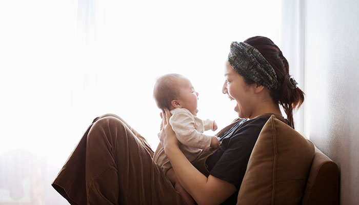 Mother and baby bonding at home