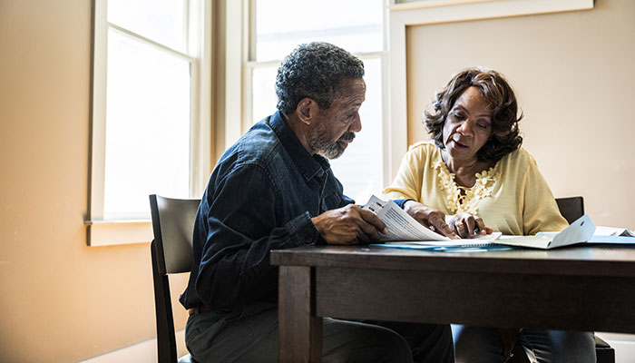 Senior couple going over medical bills 