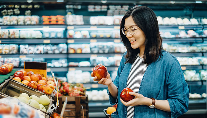 Woman shopping for a low fat diet