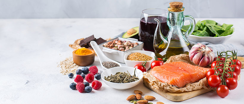 foods commonly eaten with the Mediterranean diet, including fish, olive oil, fruits, vegetables and grains