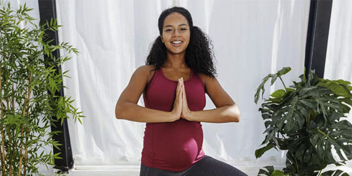 Female yoga instructor in a yoga pose