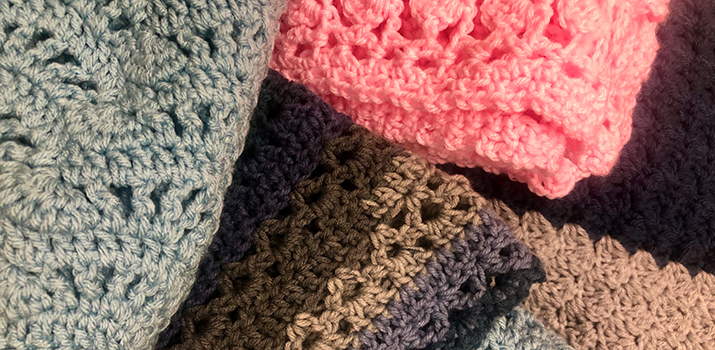 Comfort shawls and blankets made by Sue Chin, Aida Galiguis, and Naz Noei