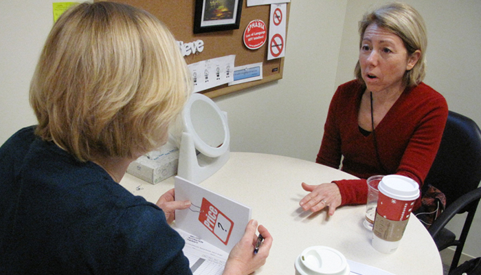 Debra Meyerson participates in a singing therapy session at BIDMC