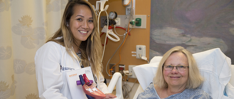 Hieu Tieu, NP, Electrophysiology, with patient Lynn Schweikart