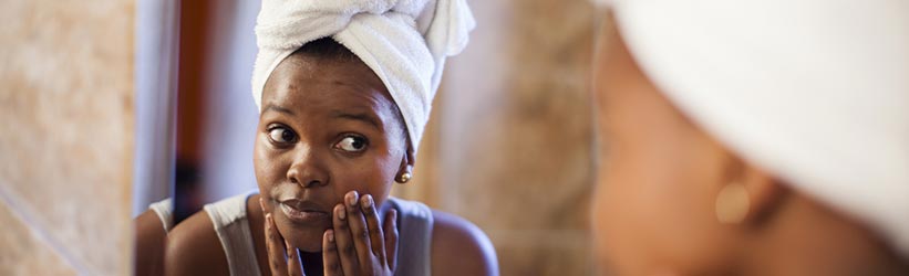 Black Woman Caring for Her Skin