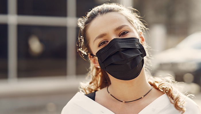 Young Woman with Face Mask