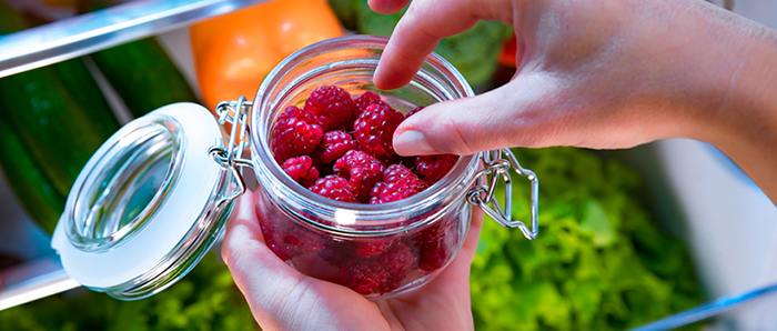 Selecting raspberries from a jar