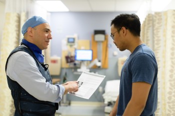 Anesthesiologist consulting with patient
