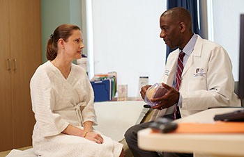 BIDMC's Dr. James speaks with a BreastCare Center patient