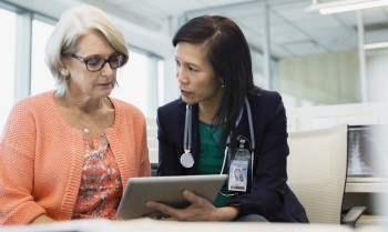 BIDMC gynecologic oncologist with patient