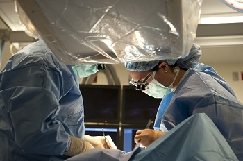 Dr. Schermerhorn performs aortic surgery.