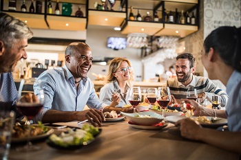 A group of people are dining at a restaurant