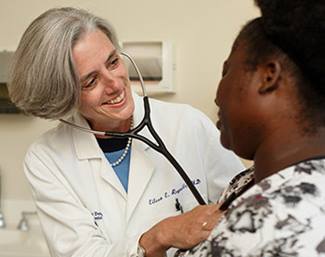 Dr. Reynolds with a Patient