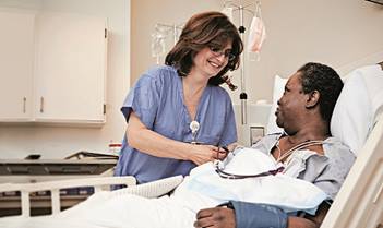 A Nephrologist talking to a patient