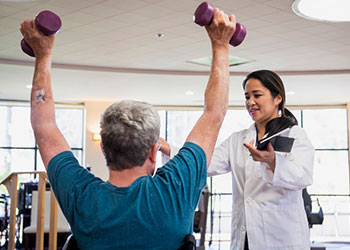 Male Parkinson's Disease Patient Using Weights