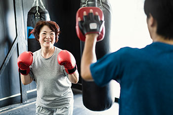 Multi-ethnic Parkinson's disease patient boxing