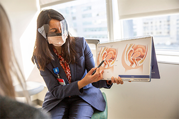 A BIDMC OB/GYN speaks with a patient.