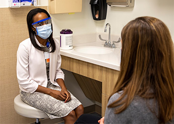 BIDMC OB/GYN provider consulting with a patient