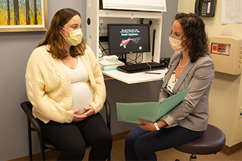 BIDMC Obstetrician meets with pregnant patient