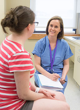 Dr. Barbara O'Brien discusses prenatal genetics with BIDMC patient.