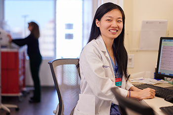 BIDMC OB/GYN resident Rui Wang, MD reviews a patient's information.