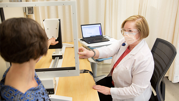 Patient undergoing exam with doctor