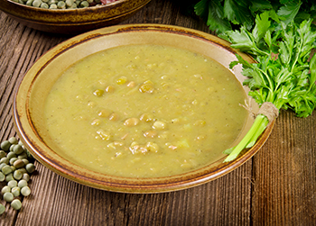 A bowl of split pea soup. 