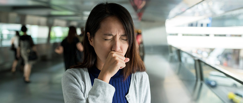 woman coughing