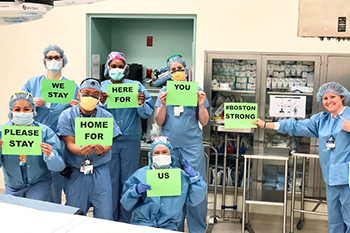 BIDMC O.R. Staff pose for a social media message inspiring everyone to stay home and stay safe.