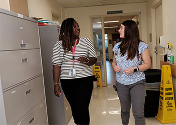 BIDMC colleagues walking outside the Social Work Department BIDMC colleagues walking outside the Social Work Department