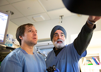 Dr. Sawhney training a fellow
