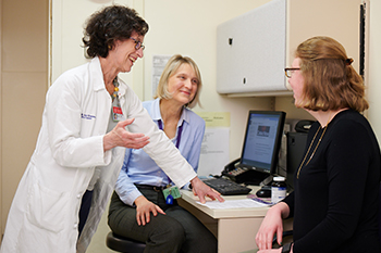 Dr Jacqueline Wolf and Melinda Dennis attending to patient