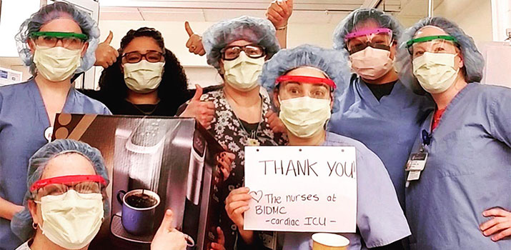BIDMC Cardiac ICU nurses with a thank you sign