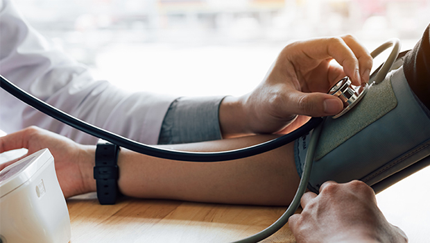 Patient getting blood pressure measured